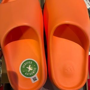 Orange yeezy slides